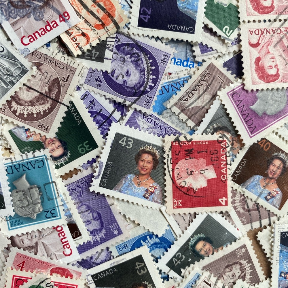 100+ QEII postage stamps